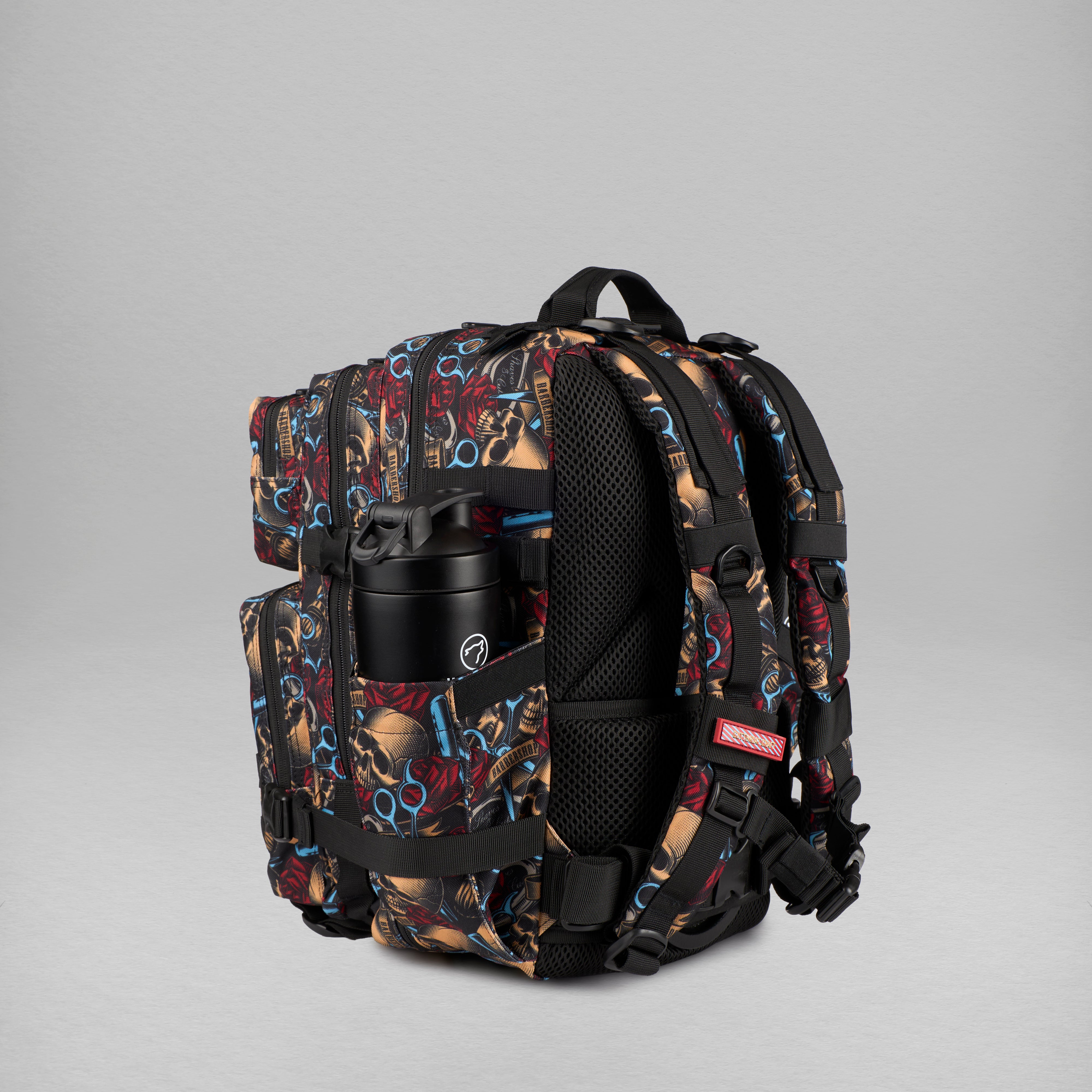 Backpack with colorful pattern and black cup holder on a gray background