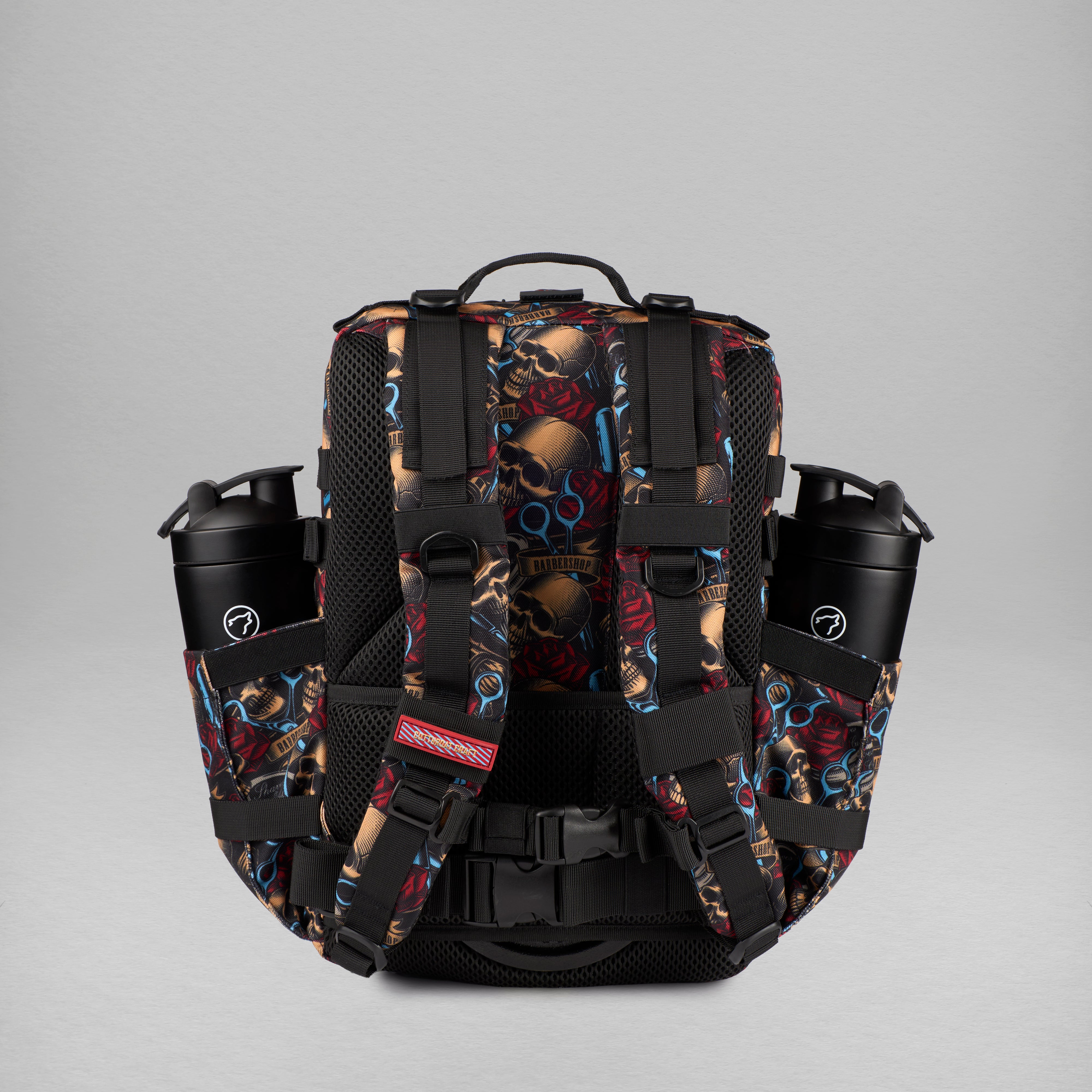 Backpack with skull and floral pattern on a gray background