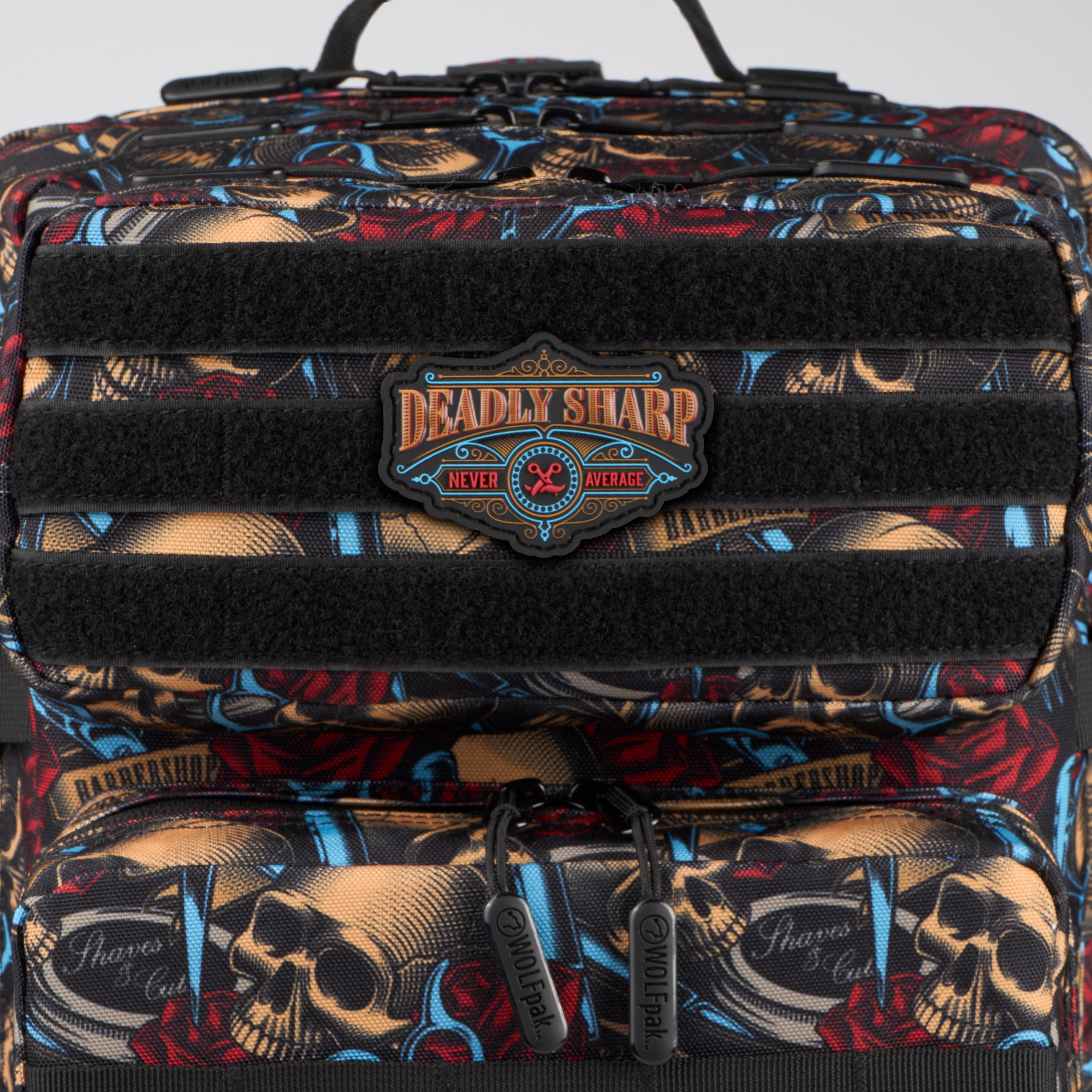 Backpack with skull design and 'Deadly Sharp' logo on a gray background
