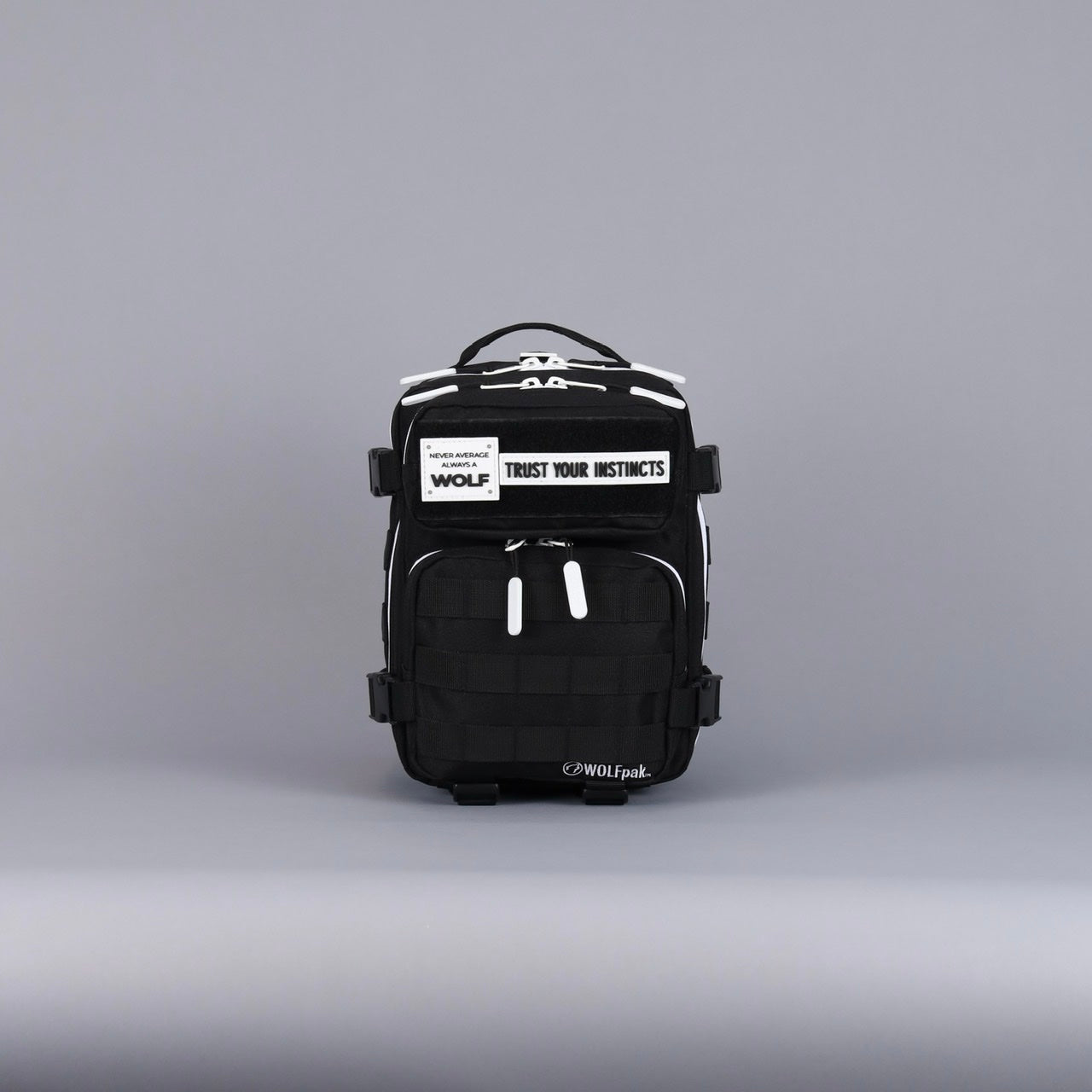 Sac à dos Mini Alpha 9L avec accents noirs et blancs