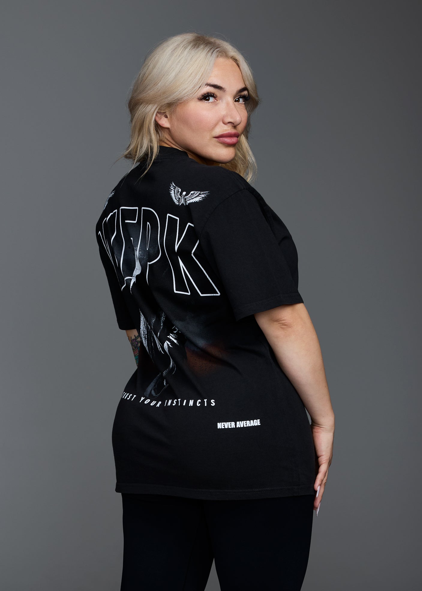 Core "INSTINCTS" Graphic T-Shirt