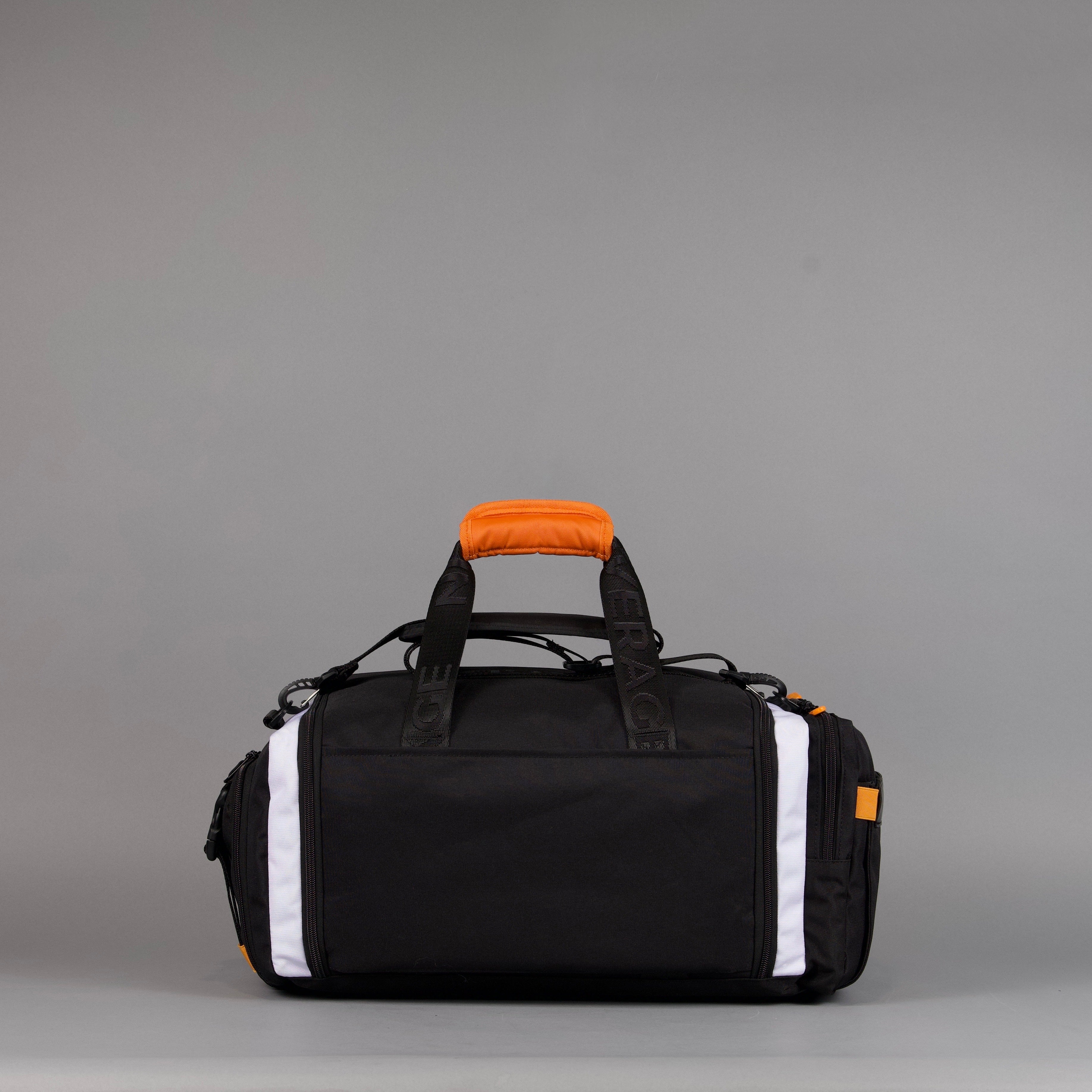 Bolsa de lona Ultimate de 30 L en negro Alpha con detalles en naranja y blanco