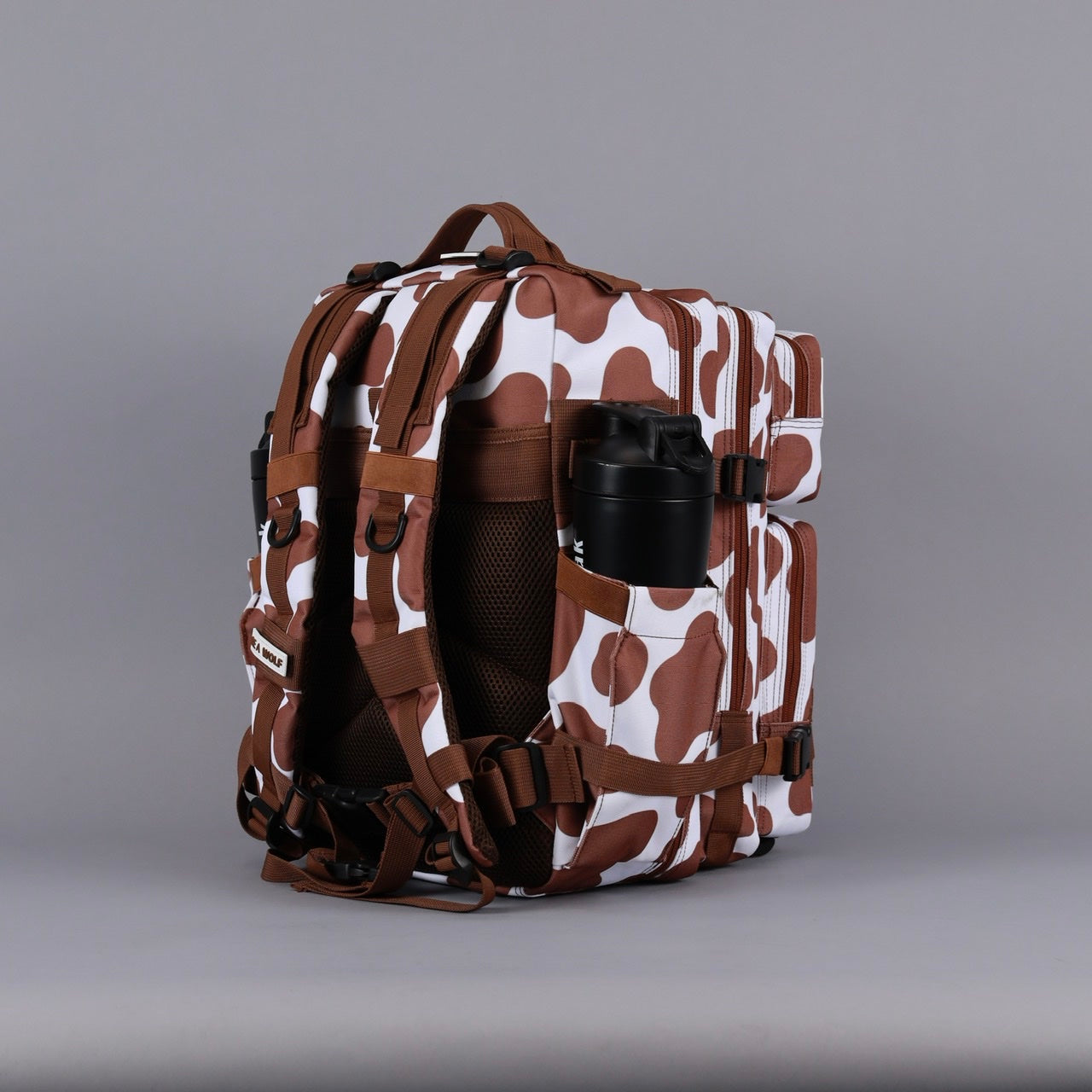 35L Backpack Brown White Cow
